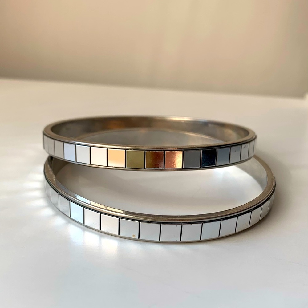 Two silver tone mirrored bangles